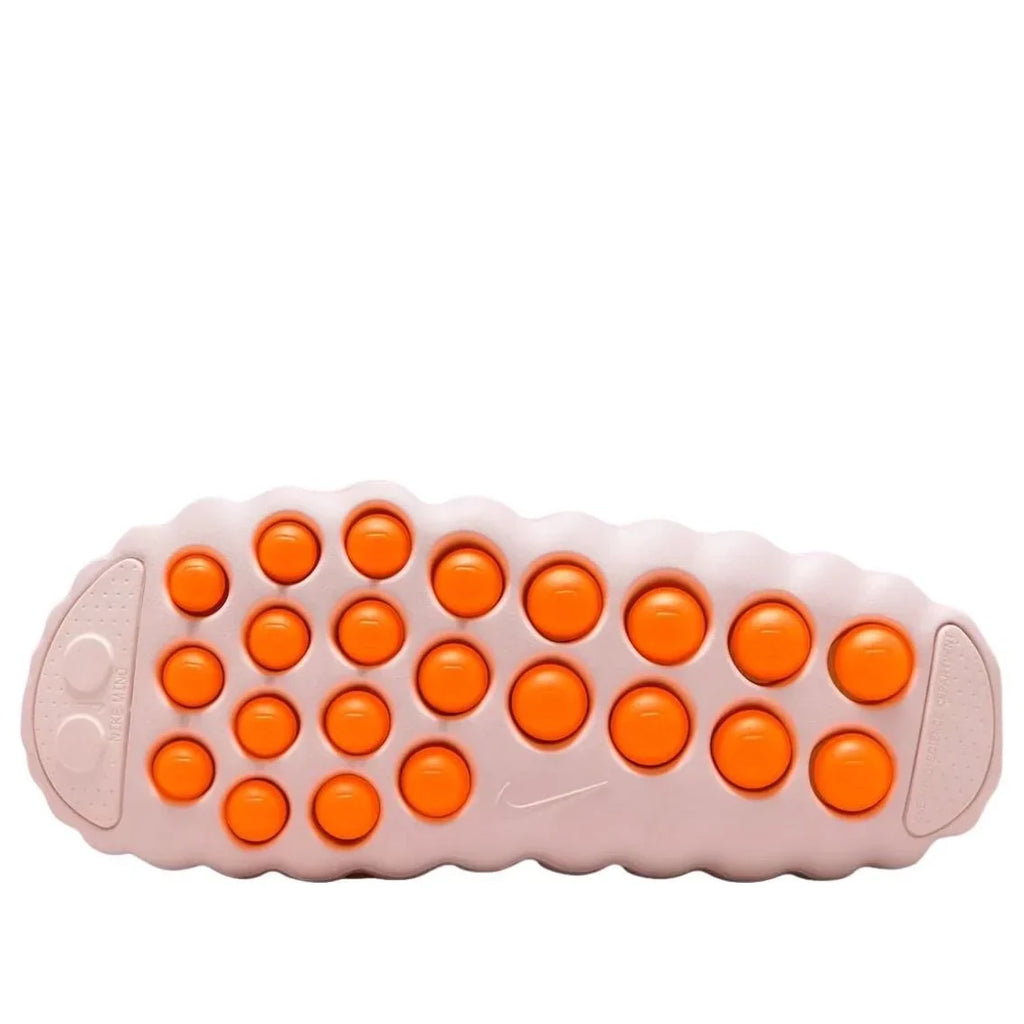 Nike Slip-On Mules – Pale Pink with Orange Accents
