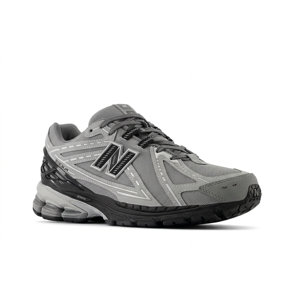 New Balance 1906R Grey - Black three-quarter view on white