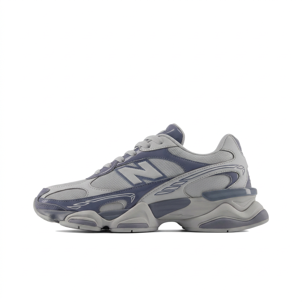 New Balance grey and navy sneaker, left-facing side view on white