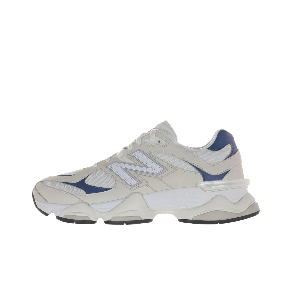 New Balance 9060 cream and navy left-facing side view on white