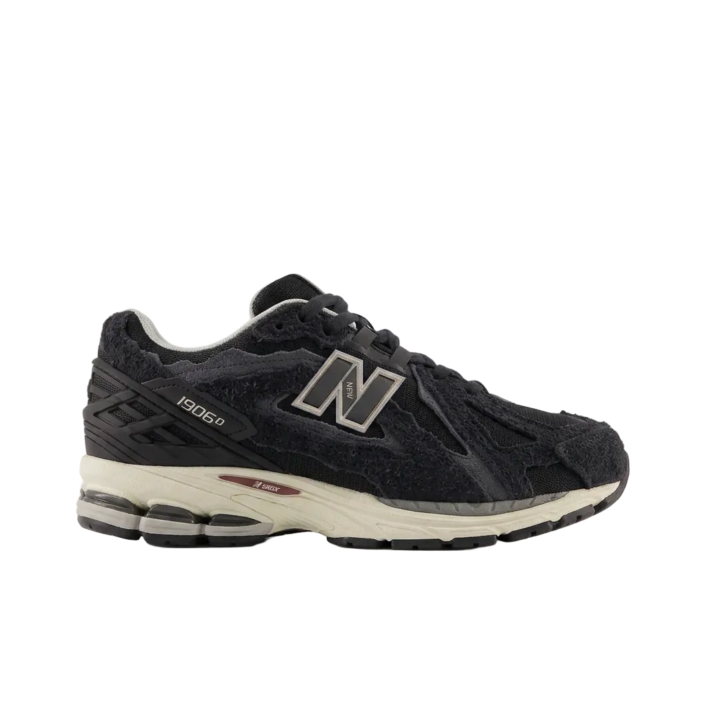 New Balance 1906R Black - Cream side view on white background