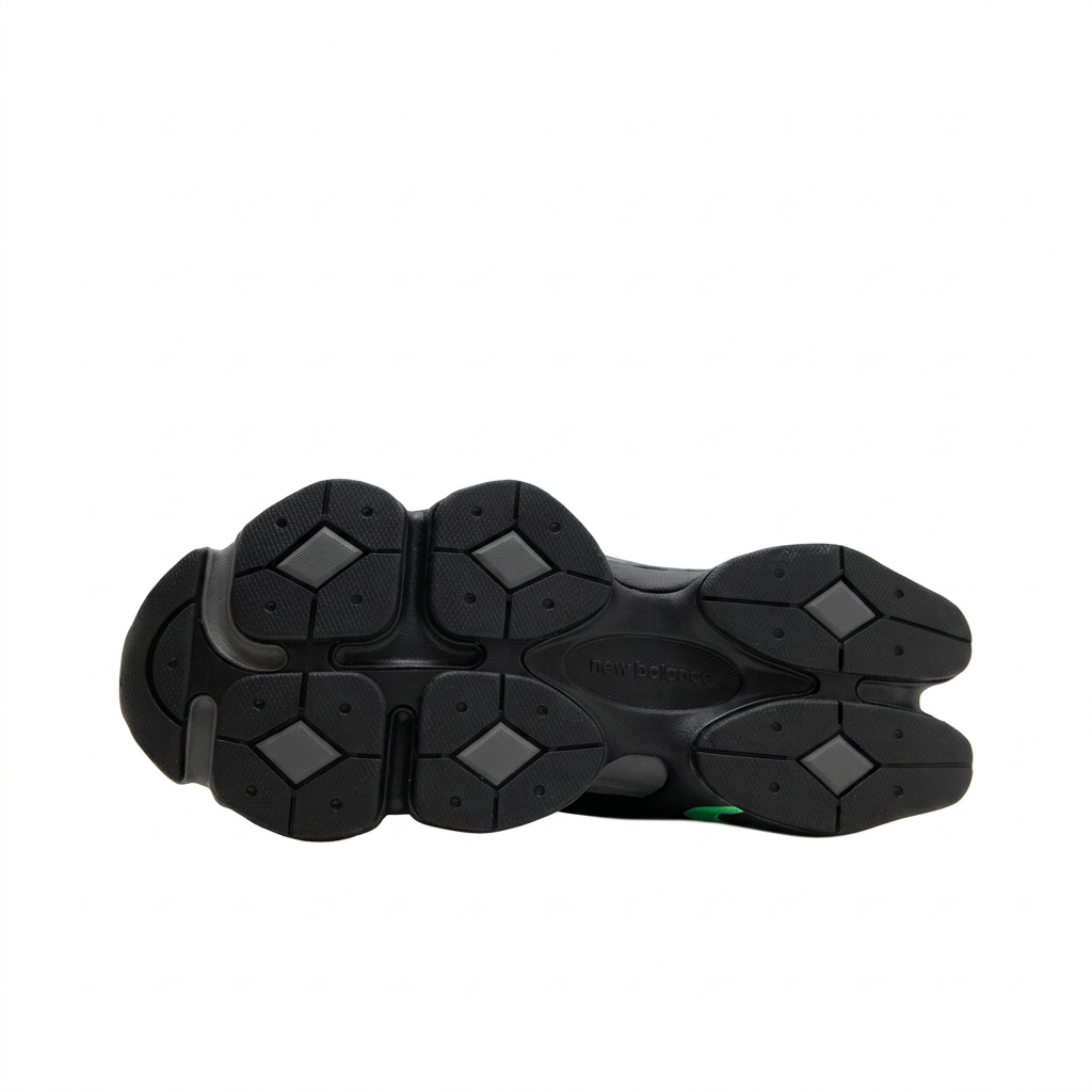 New Balance 9060 Black Green outsole on white background