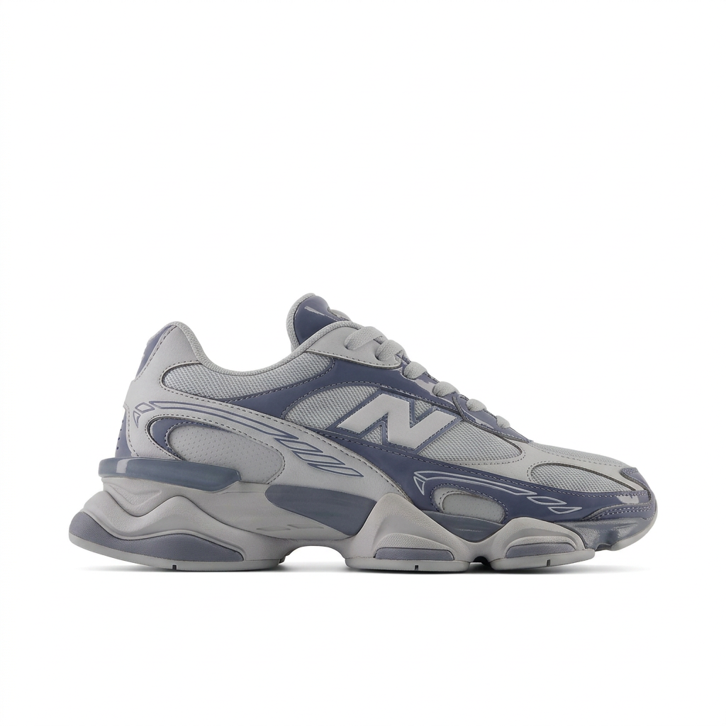 New Balance grey and navy sneaker, right-facing side view on white