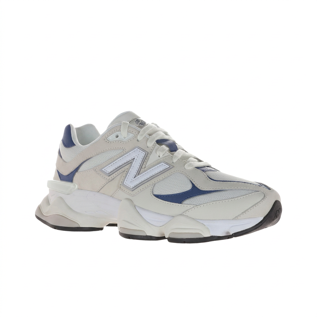 New Balance 9060 cream and navy front three-quarter view on white
